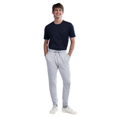 Man wearing gray French Terry performance jogger from Globetrotter product P00865 with cart button