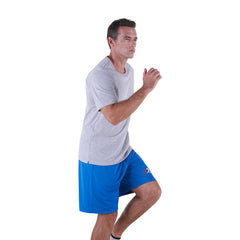 Man in athletic wear showcasing P04475 Wave Adult Athletic Shorts with Pockets for active use