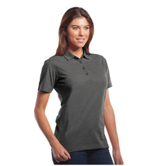 Woman wearing a gray ladies poly cotton polo shirt from S05751 Fairway collection