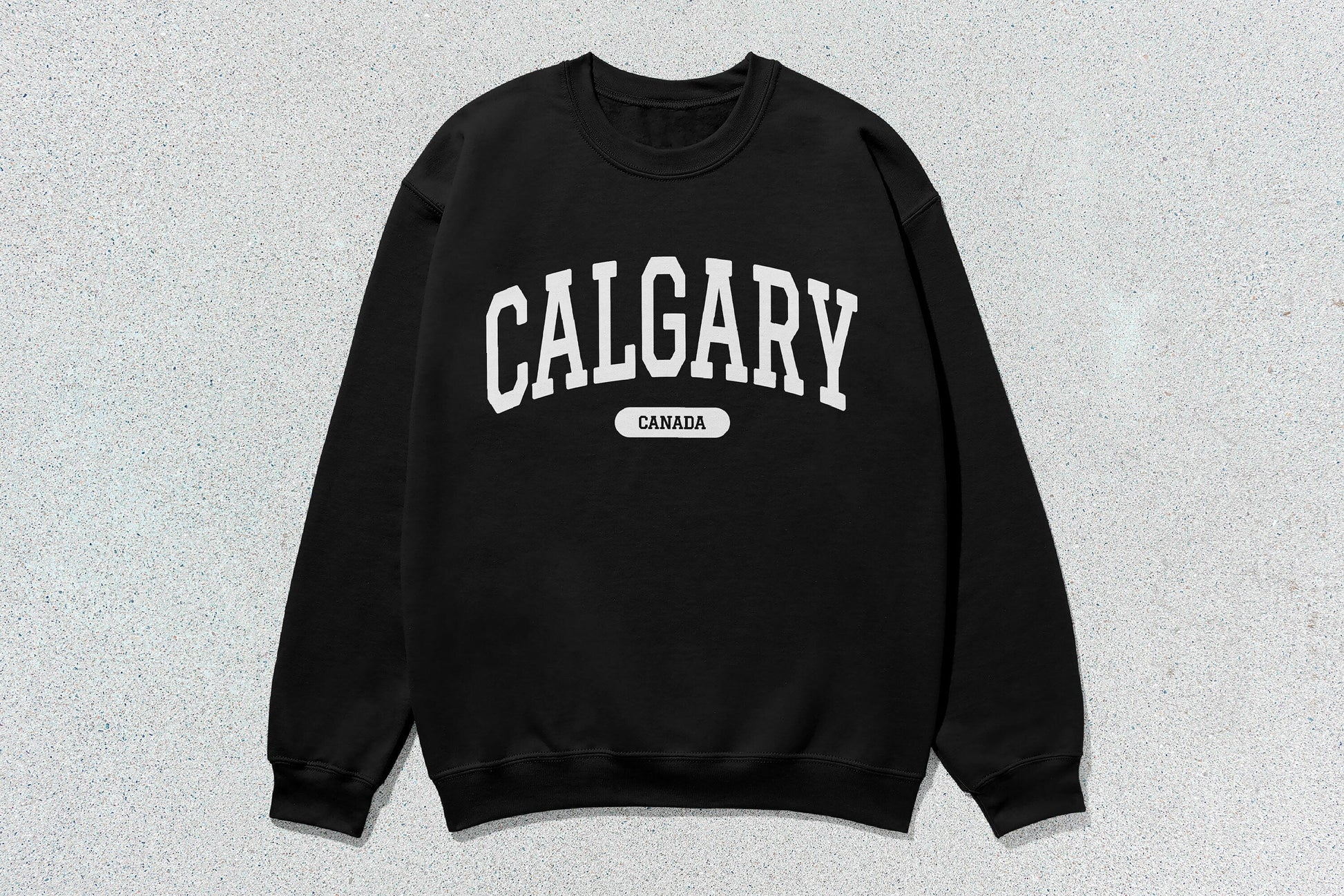 Black Calgary crewneck sweatshirt featuring Calgary Canada text in unisex heavy blend fabric for custom apparel