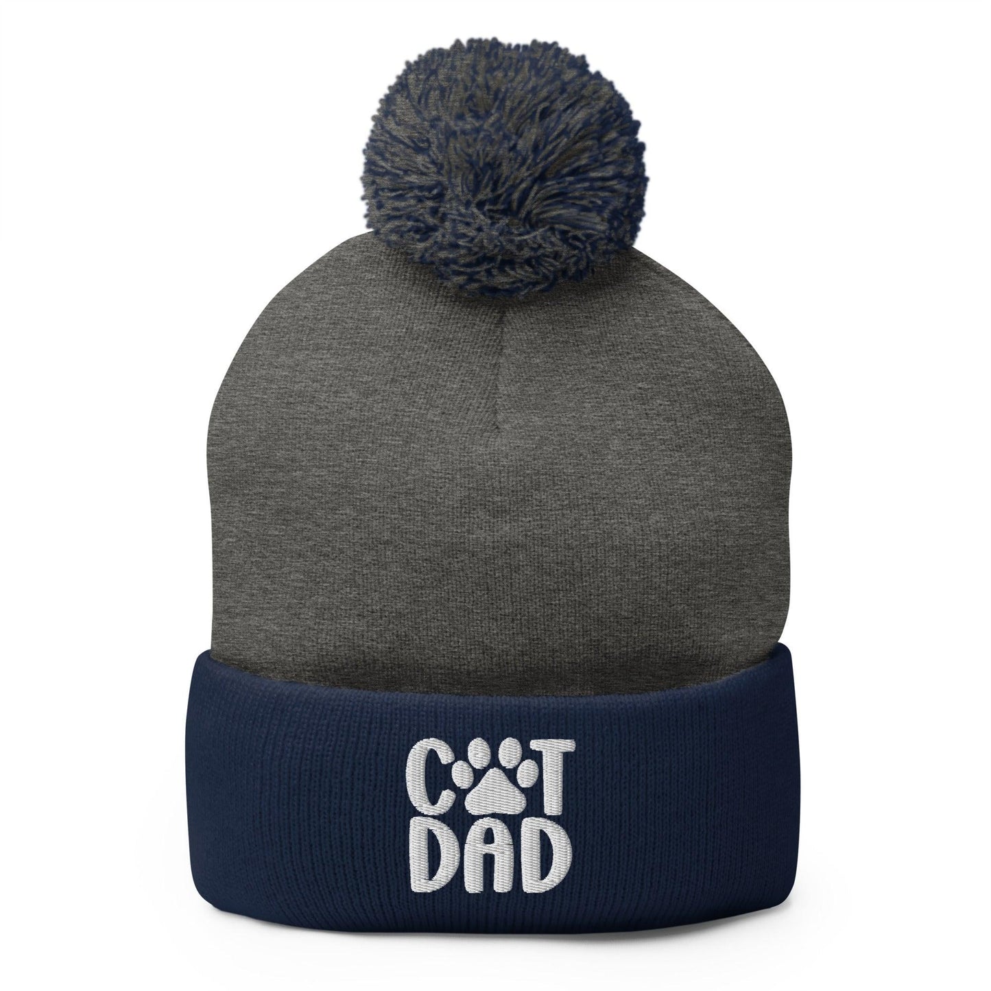 Gray and navy blue knit pom pom beanie with cat dad embroidered detail