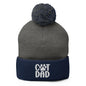 Gray and navy blue knit pom pom beanie with cat dad embroidered detail