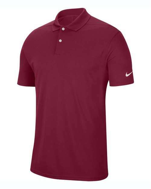 Maroon Nike polo shirt showcasing custom apparel with screen printing Toronto for the Dominate with Victory polo product