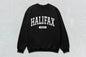 Black Halifax sweatshirt featuring custom apparel design on unisex heavyweight crewneck with screen printing
