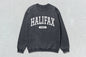 Gray Halifax Unisex Heavy Blend Crewneck Sweatshirt showcasing custom apparel and screen printing