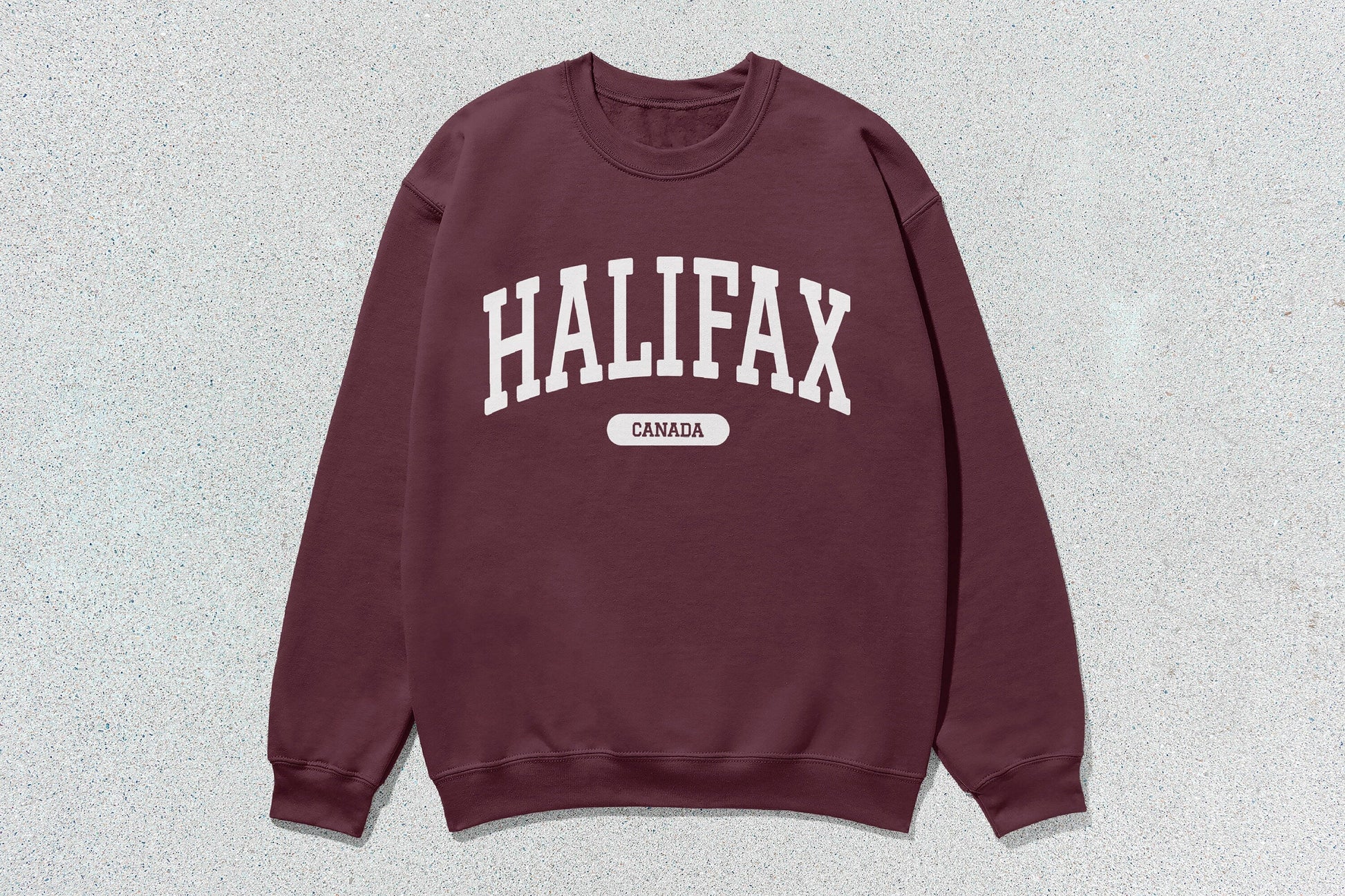 Maroon Halifax unisex heavy blend crewneck sweatshirt showcasing premium custom apparel with screen printing