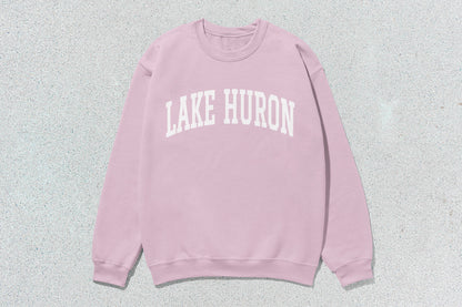 Pink crewneck sweatshirt with Lake Huron text, ideal for custom apparel and lake lovers