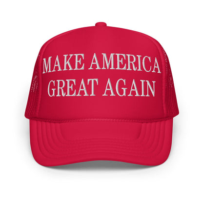 Red MAGA Make America Great Again embroidered foam trucker hat displayed for sale