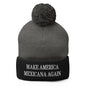 Gray and black embroidered knit pom beanie featuring Make America Mexicana design and Claudia Sheinbaum branding