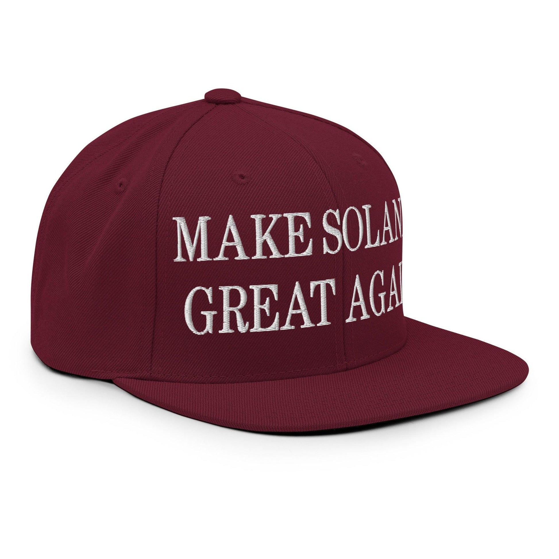 Maroon baseball cap with Make Solana Great Again and Official Trump Meme Coin embroidery