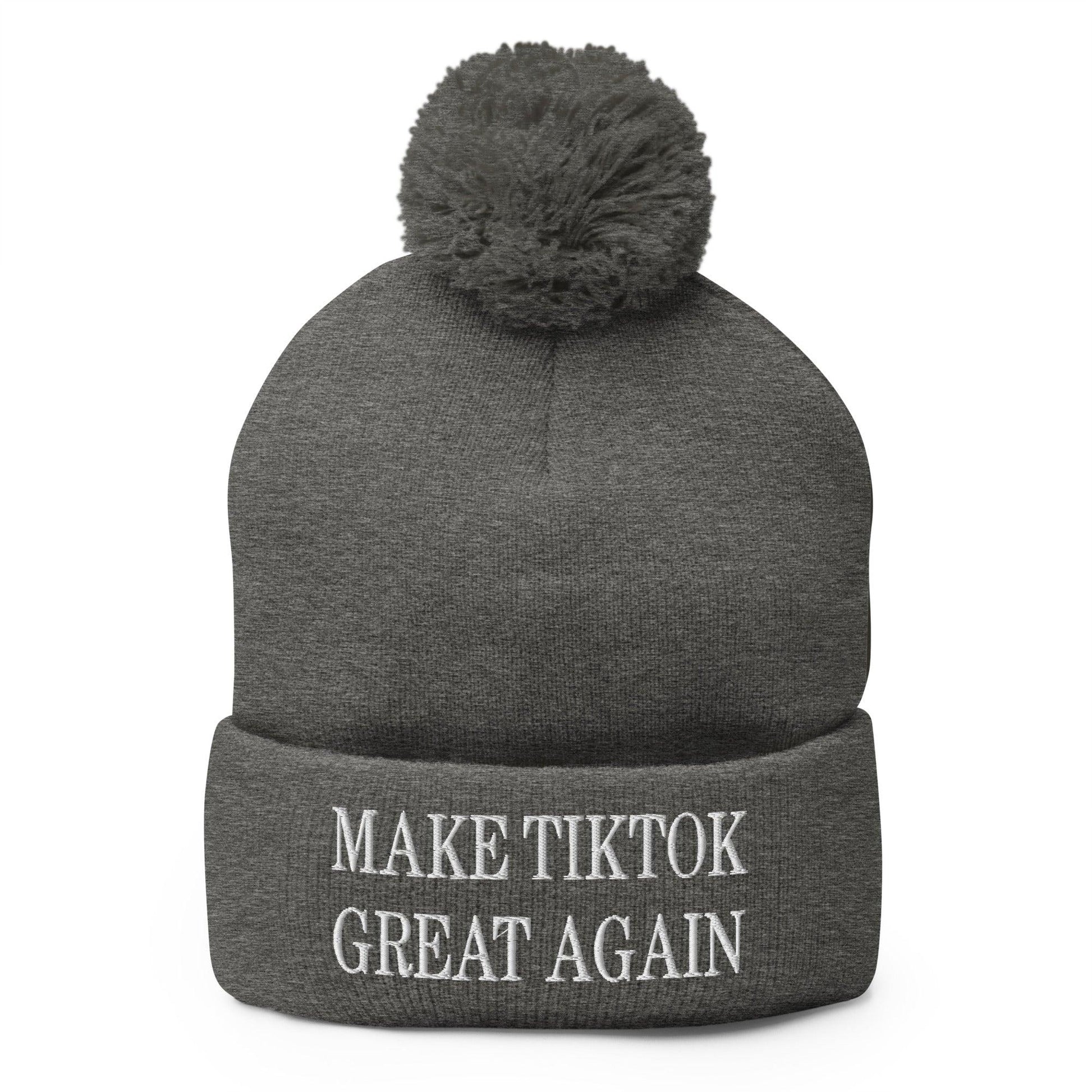 Gray knit pom pom beanie with embroidery featuring the Make TikTok Great motif