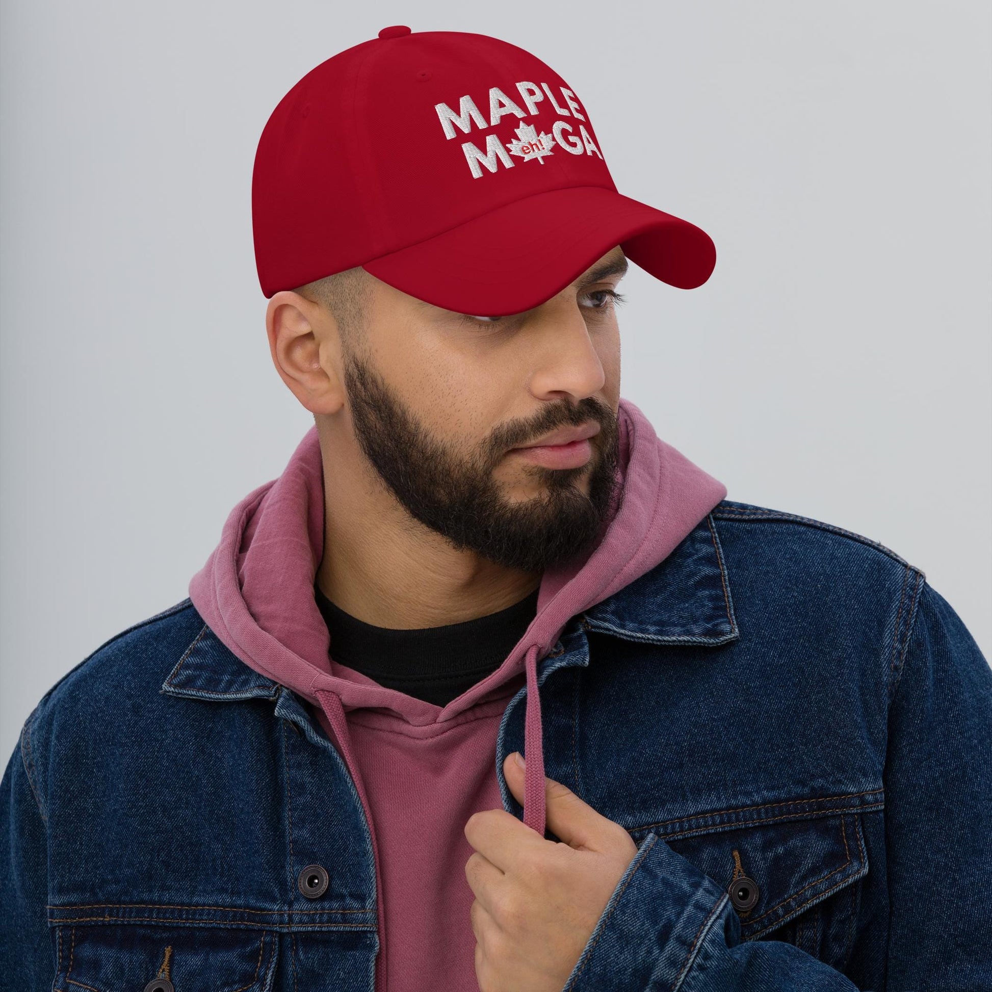Red Maple MAGA embroidered dad hat displayed with cart button for easy purchase