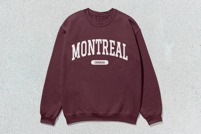 Maroon Montreal crewneck sweatshirt with Montreal Canada text in heavy blend fabric for custom apparel