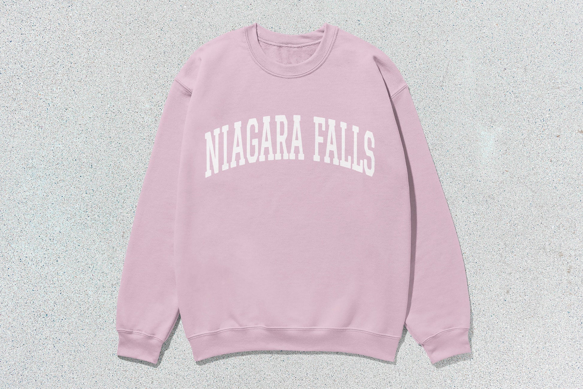 Pink Niagara Falls sweatshirt in custom apparel featuring screen printing for a stylish look