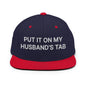 Put It on My Husband’s Tab Embroidered Flat Bill Brim Snapback Hat - Navy/ Red