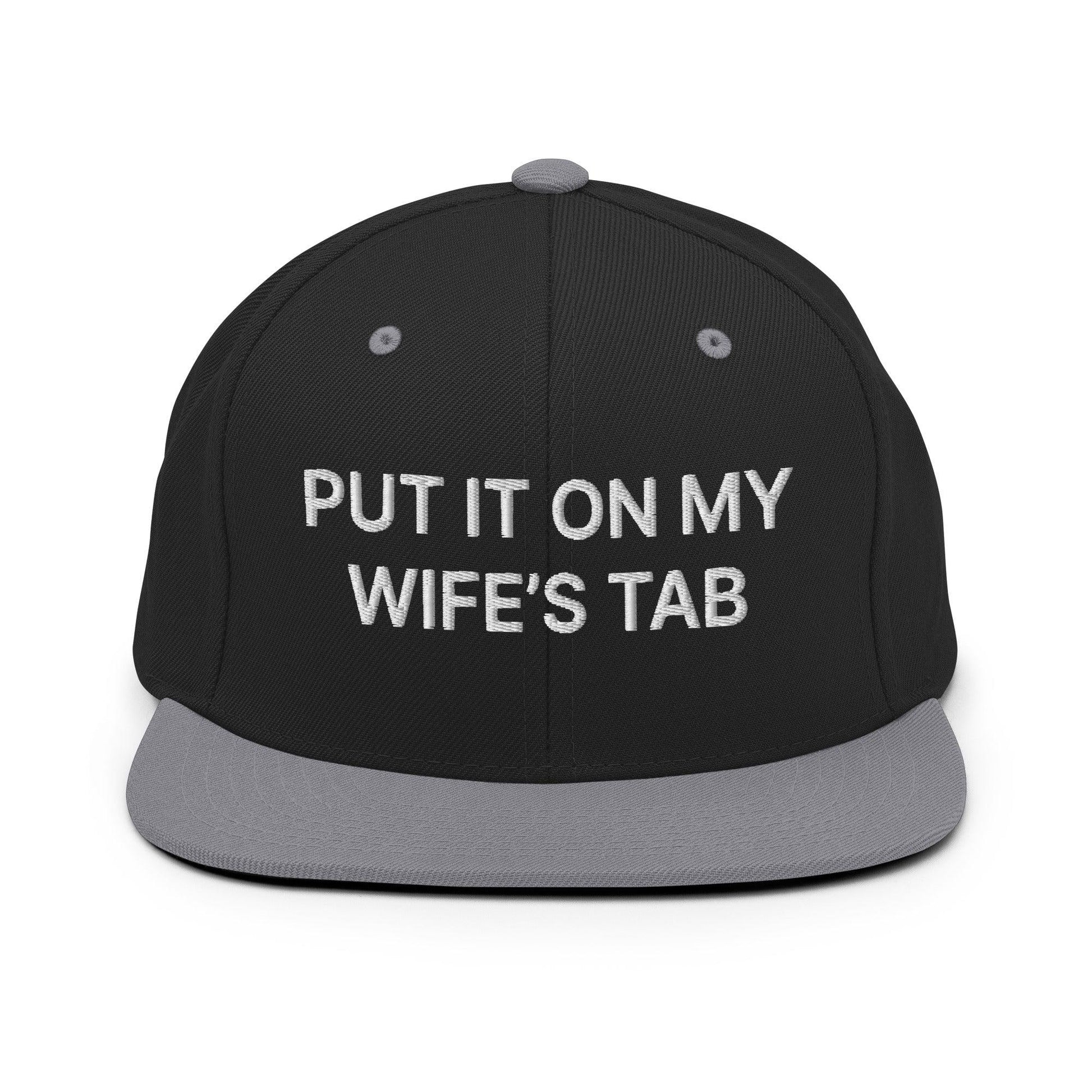 Put It on My Wife’s Tab Embroidered Flat Bill Brim Snapback Hat - Black/ Silver