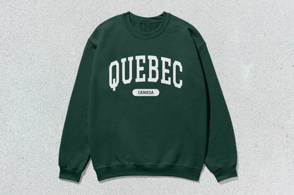 Green Quebec unisex heavy crewneck sweatshirt with Quebec Canada text and heavy blend fabric