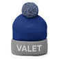 Blue and gray knit pom pom beanie with embroidered Valet Uniform design